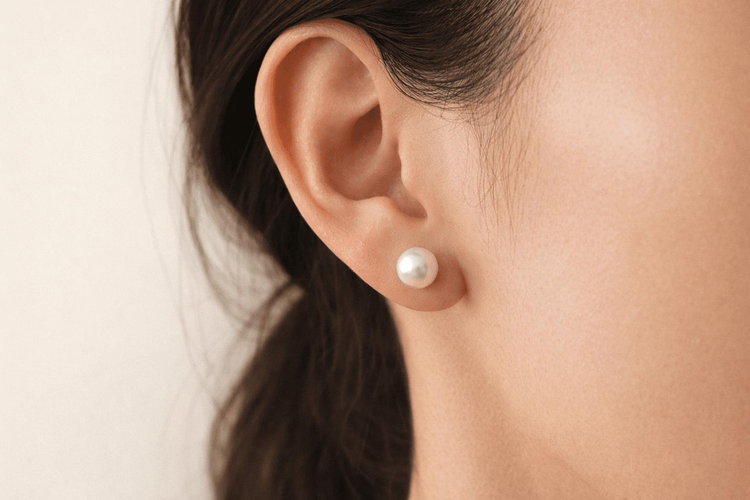 First pearl earrings styled for everyday wear